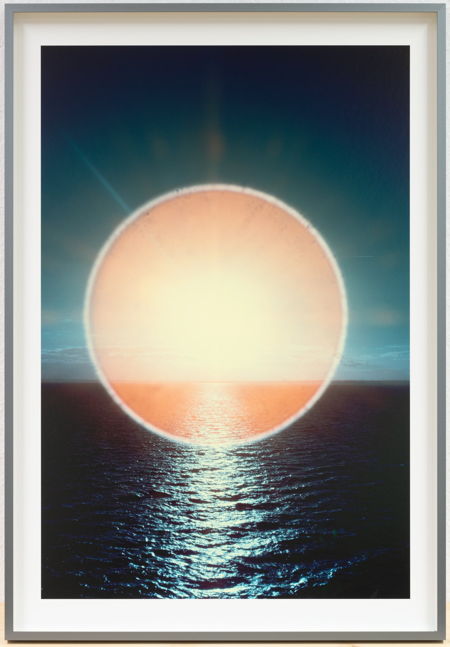 SUN HALO: PLAY OF LIGHT OVER OCEAN WAVES, DEUTSCHLAND